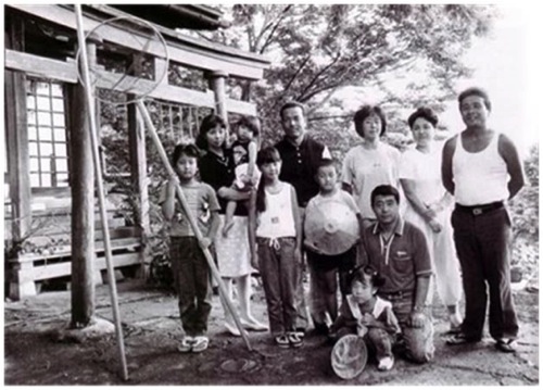 family shrine in the small garden of the Yamamatsu home and Nishikigoi outlet in Mushigame village. 